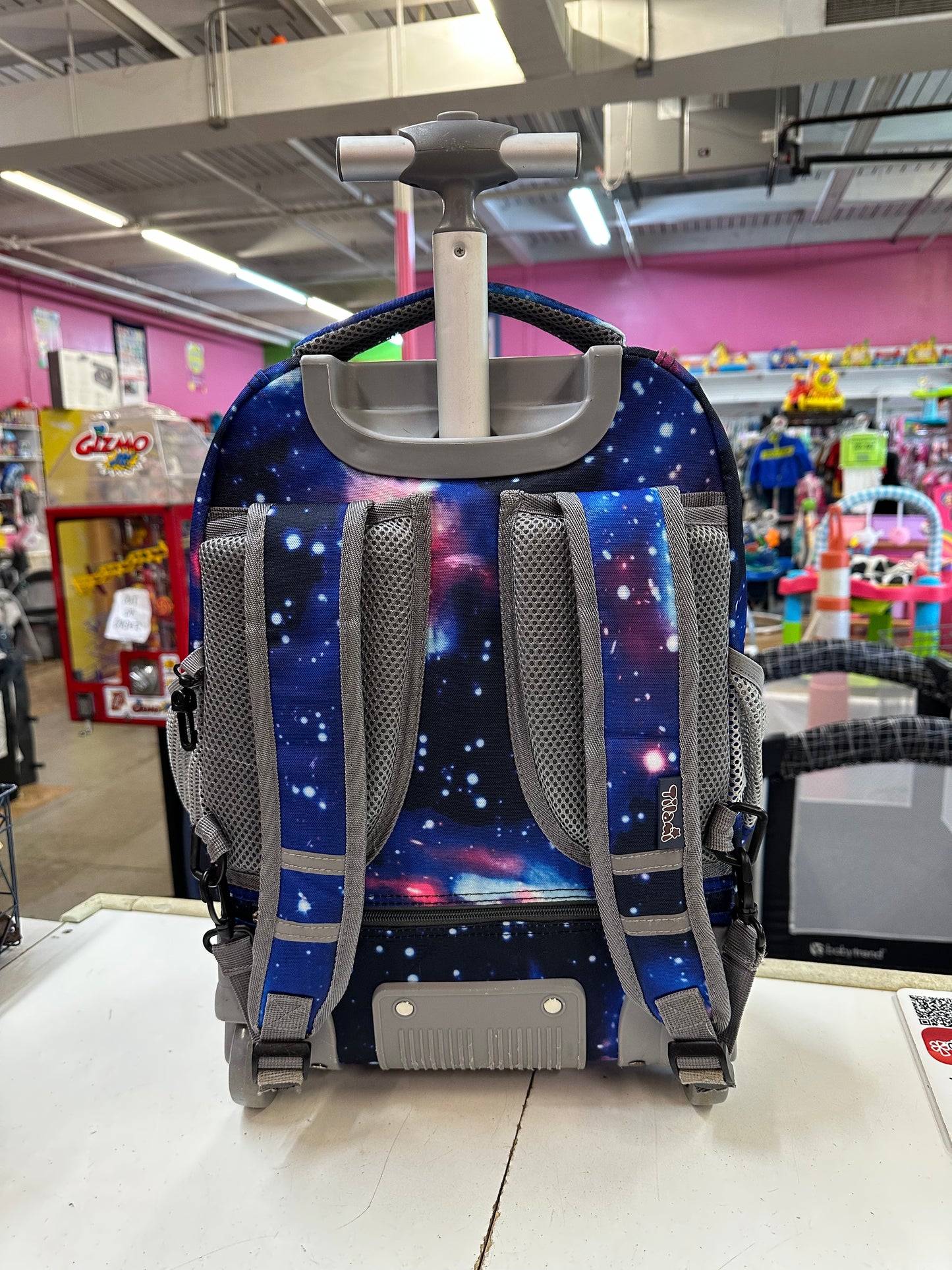 Tilami Rolling Backpack